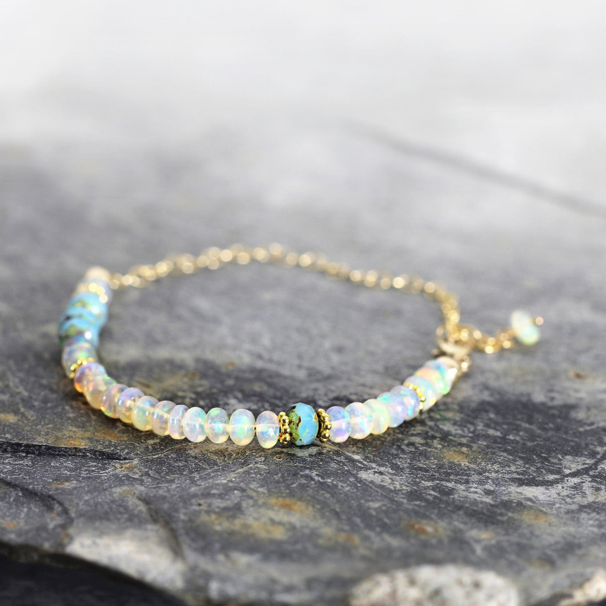 A White Opal Bracelet with Iridescent rainbow coloured beads and gold chain