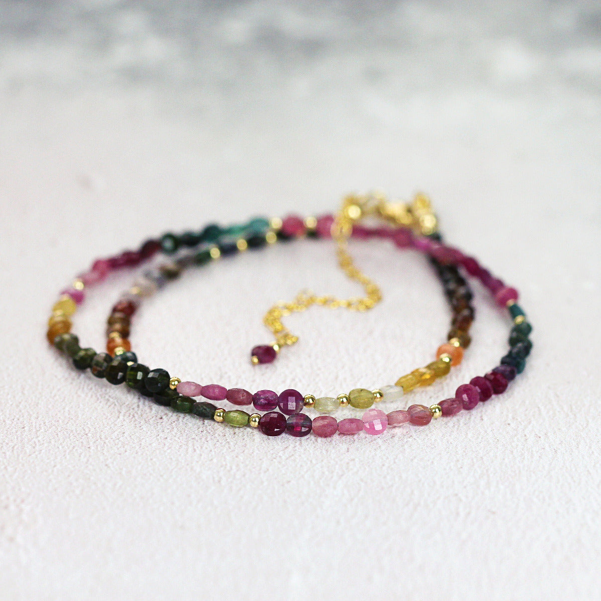 Colourful Multi Coloured Tourmaline Necklace with pink, plum, green and yellow beads. 